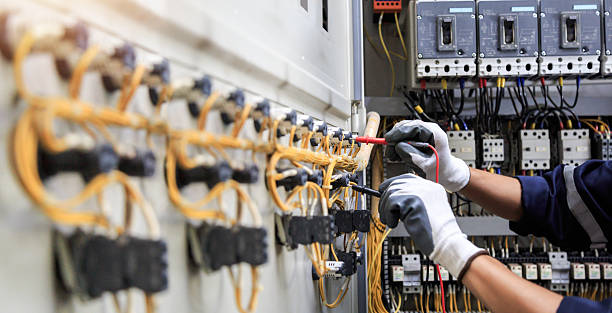 Professional Electrician technician working in Sunset, FL
